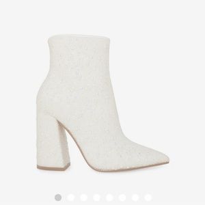 Brand new - now sold out Steve Madden White Nelle Boot. Non returnable